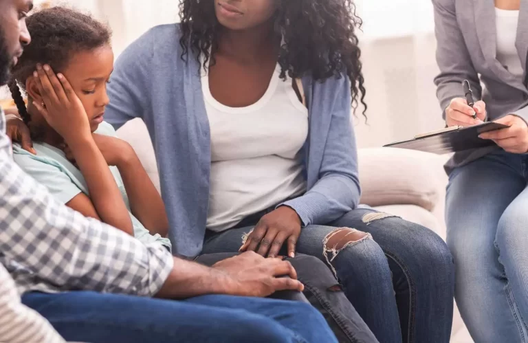 How Does Family Influence Mental and Emotional Health – parents comforting their child during family therapy session
