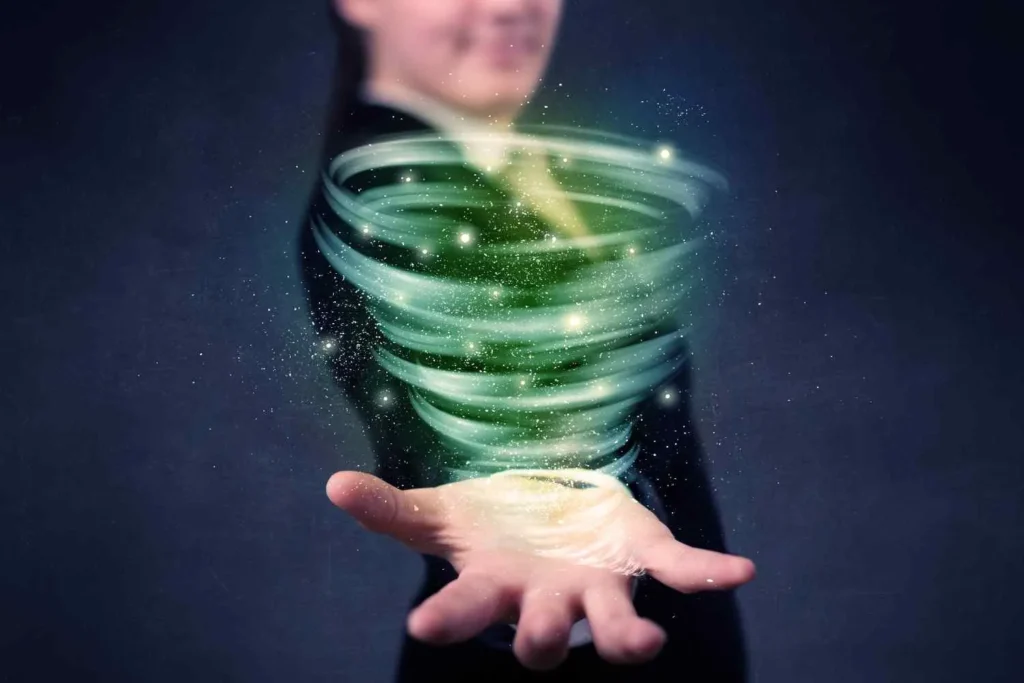 Person holding a glowing spiral symbolizing Emotional Spiraling Emotional Spiraling and intensifying emotions