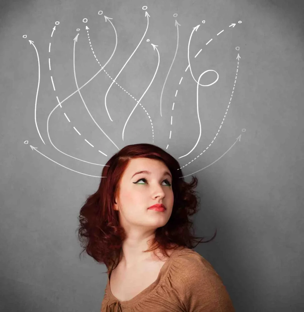 Spiraling Meaning Mental Health - Young woman thinking with multiple directional arrows pointing in different directions, symbolizing confusion, indecision, and mental overwhelm